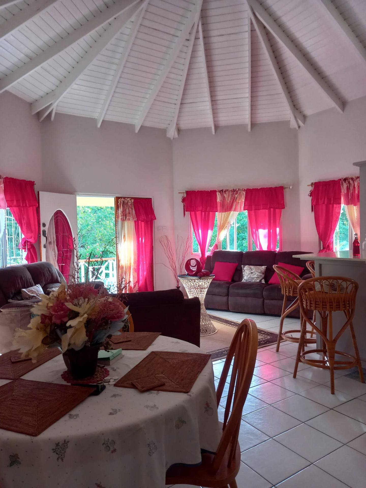 Living and dining area opening onto the veranda