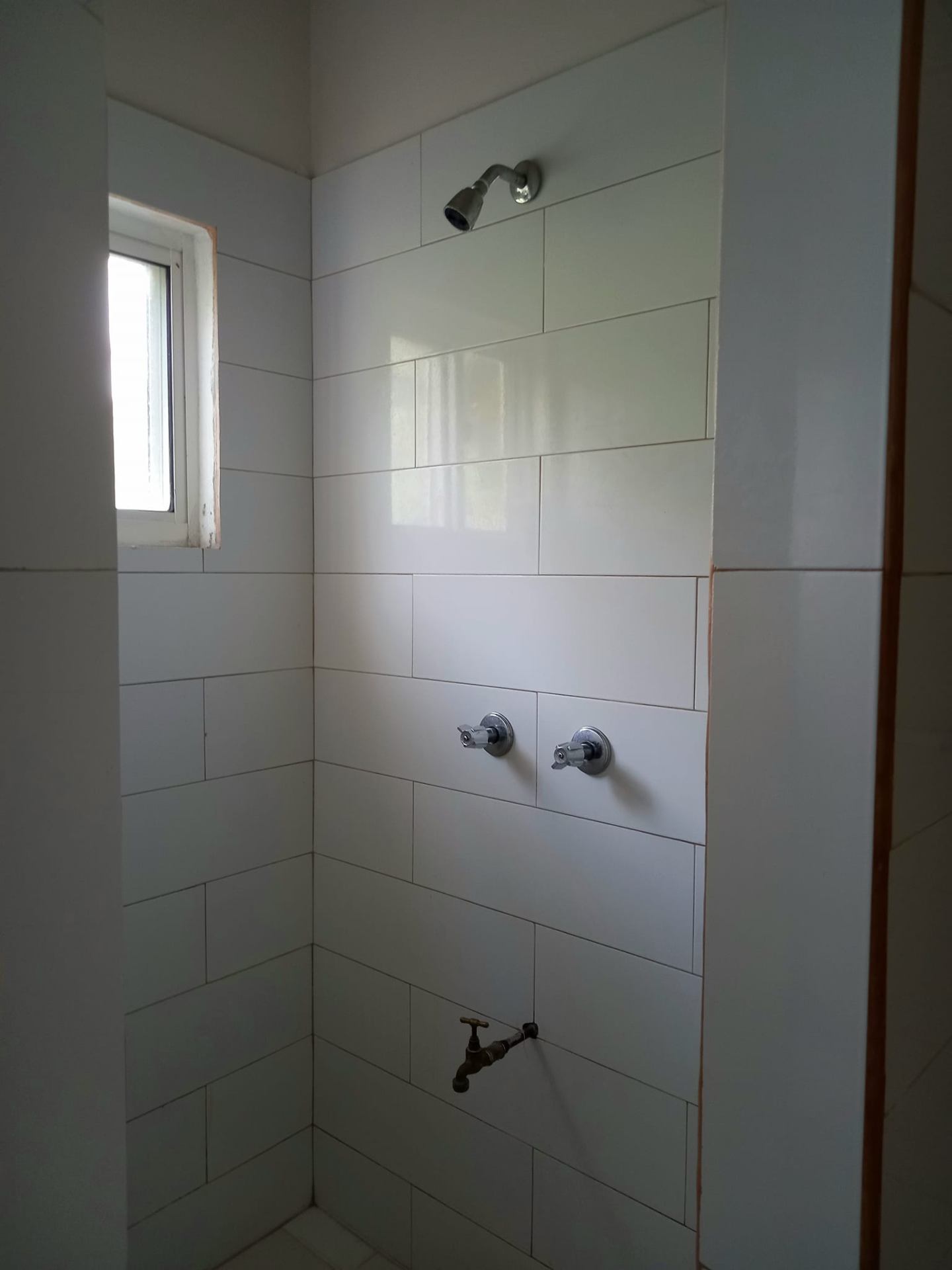 Second bathroom with tiled shower