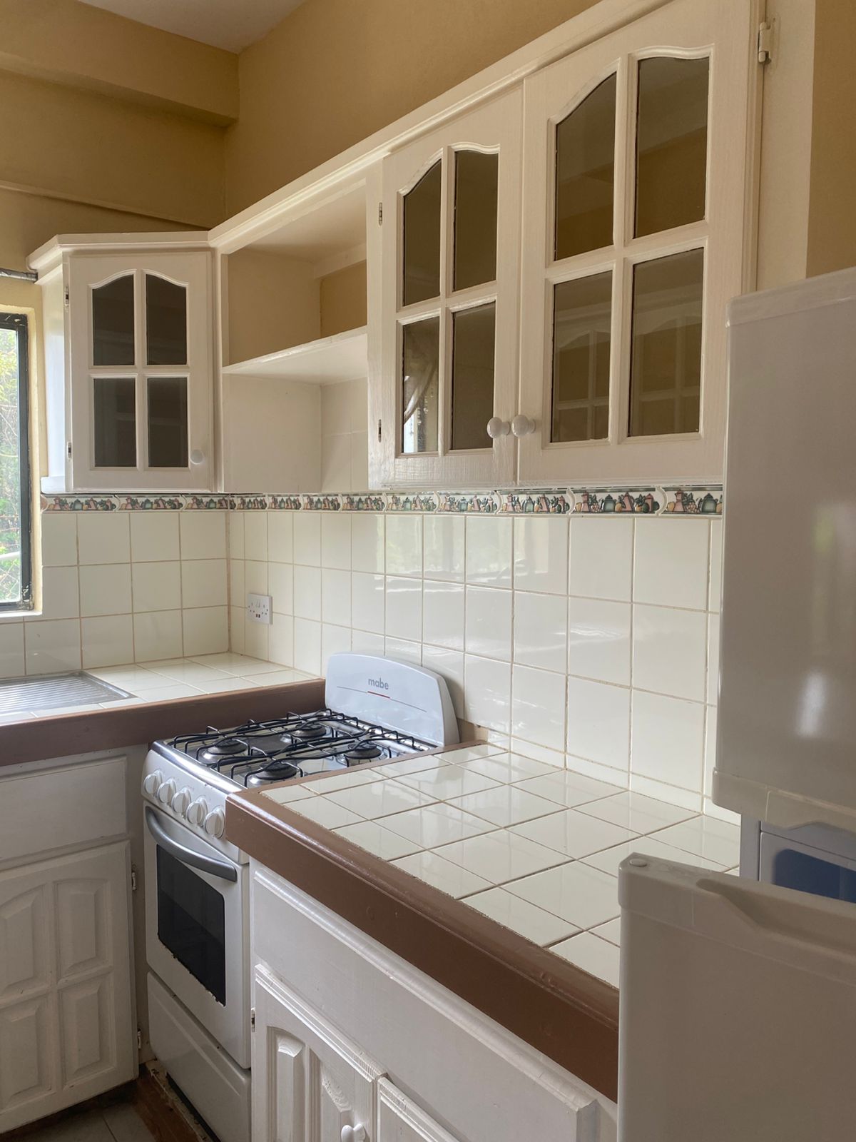 Kitchen with gas stove and cooking area