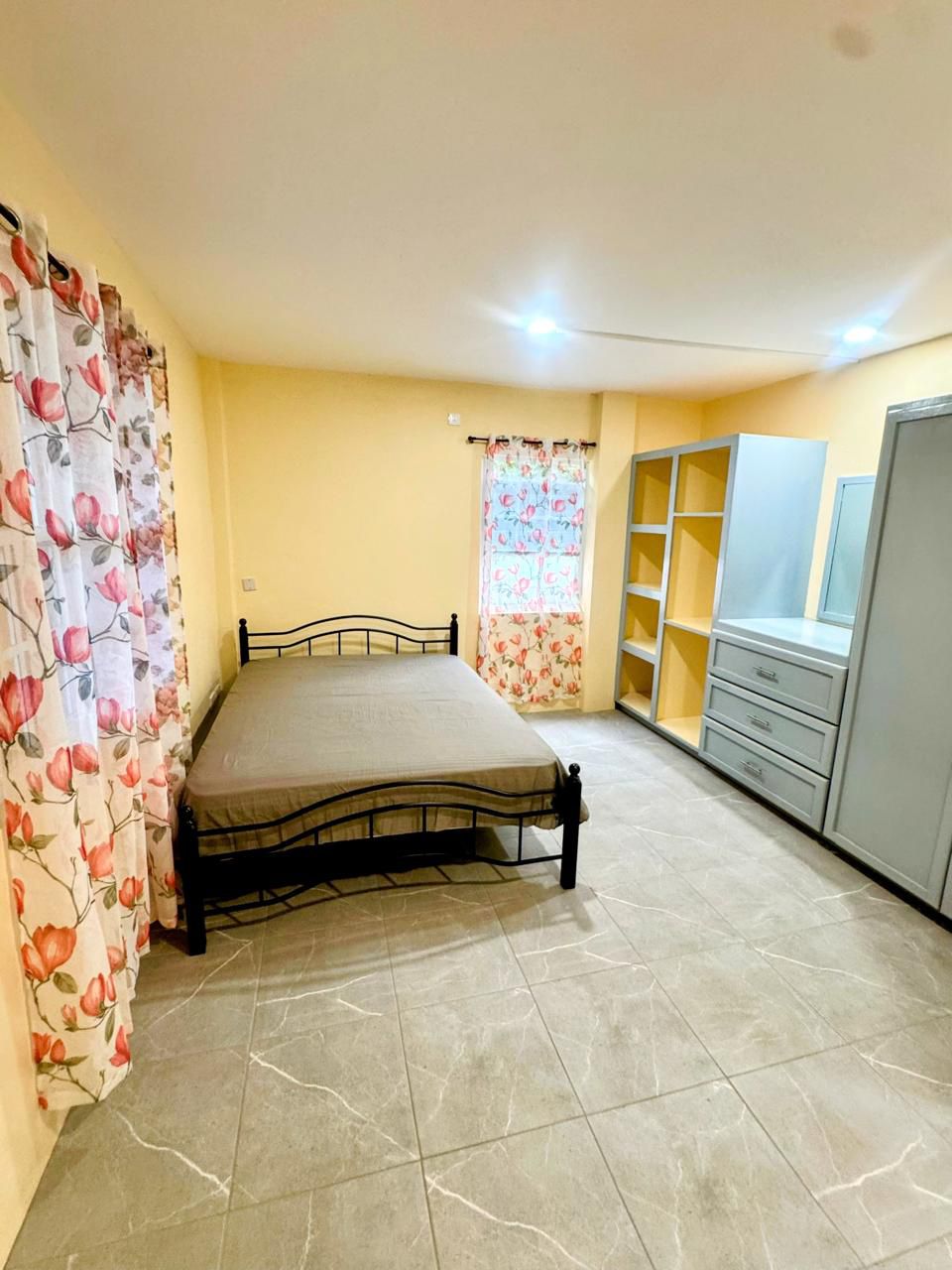 Second bedroom with double bed, wardrobe and shelving