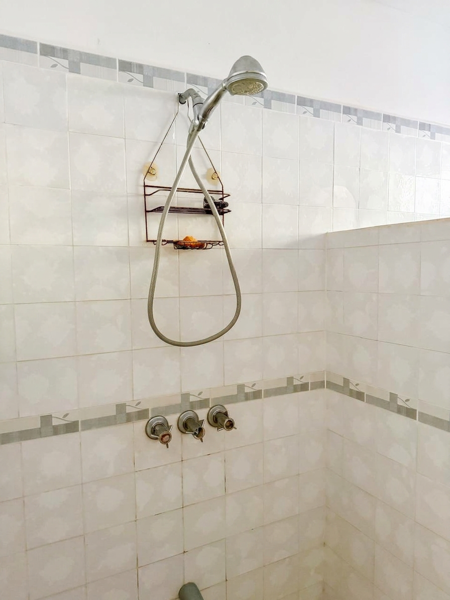 Tiled bathroom with shower
