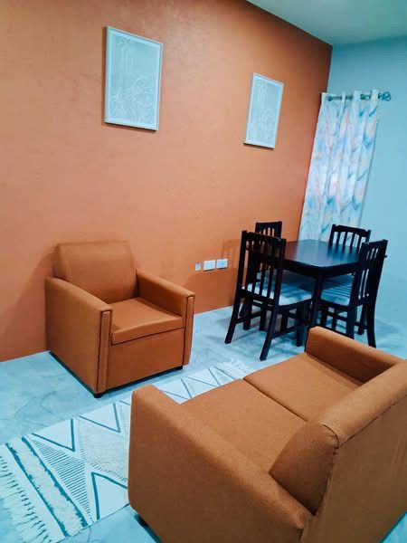 Warm accent wall with dining table, chairs and lounge seating